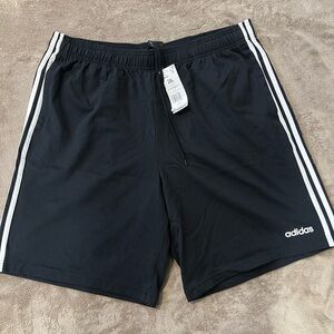 Adidas Black and White Athletic Shorts with Iconic Stripes
